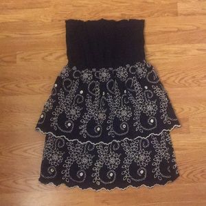 Yoana Baraschi navy and white strapless dress.